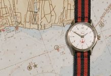 Elérhető a NOAH x Timex MK1 Anchor Gift Set: két textilszíjjal jön a 36 mm-es MK1 NOAH x Timex MK1 Anchor watch with a white dial and red-and-navy striped fabric strap displayed on a nautical chart.