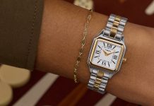 A kis órák visszatérnek – de nem mindegy, hogyan viseled őket Timex Legacy Addison two-tone square watch with white Roman-numeral dial, worn on the wrist beside a delicate gold chain bracelet.