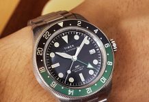 Két új automatával bővül a Timex Waterbury Heritage Timex Waterbury Heritage Automatic GMT watch worn on wrist with stainless steel bracelet and black dial.