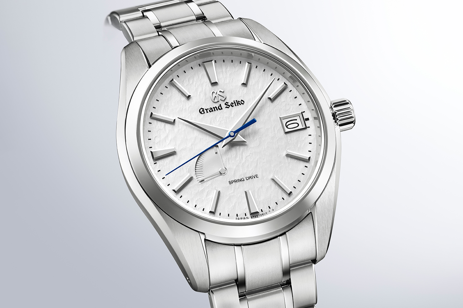 Grand Seiko SBGA211 Snowflake: A titán, a Spring Drive és a Hotaka-hegység hava A Grand Seiko SBGA211 Snowflake számlapja kékített másodpercmutatóval és járástartalék-kijelzővel