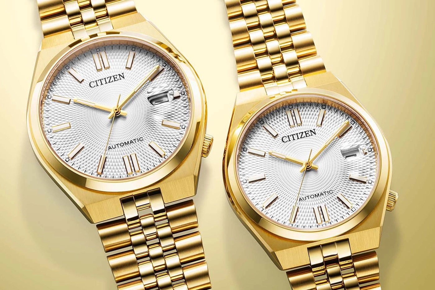 Két aranyozott Citizen Tsuyosa 60 ezüst számlappal: a 40 mm-es NK0022-50A és a 37 mm-es NK0032-56A egymás mellett